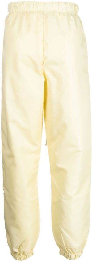 FEAR OF GOD ESSENTIALS Trainingsbroek met logopatch Geel