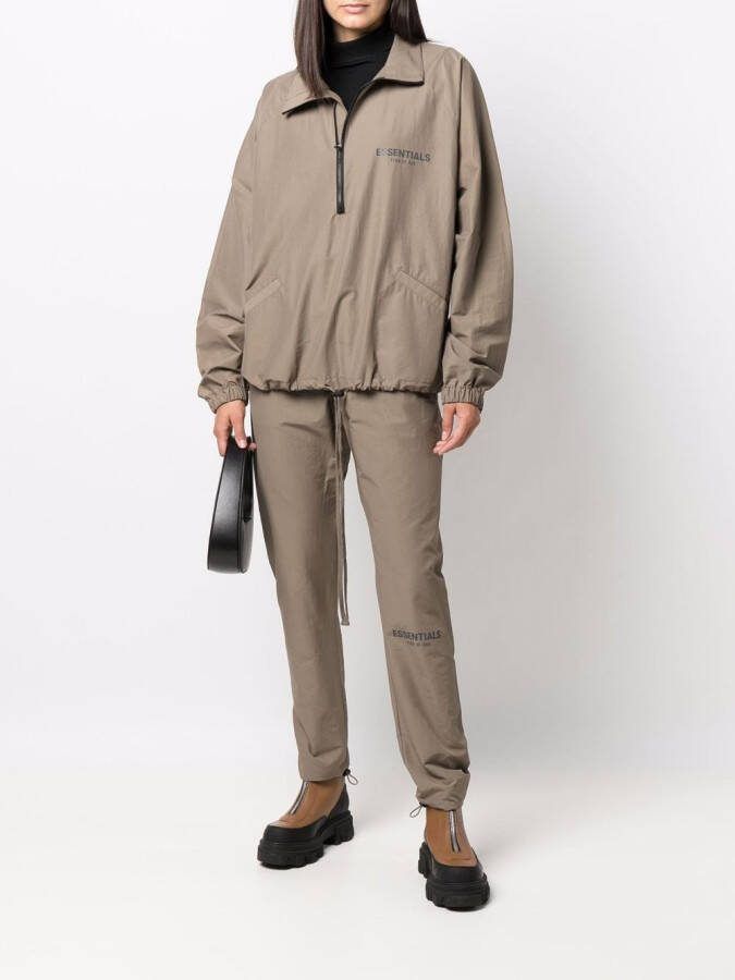 FEAR OF GOD ESSENTIALS Trainingsbroek met logoprint Groen