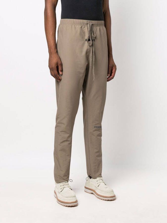 FEAR OF GOD ESSENTIALS Trainingsbroek met logoprint Groen