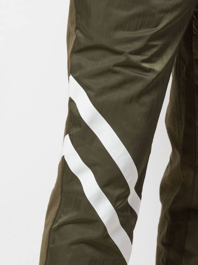 God's Masterful Children Trainingsbroek met geometrische vlakken Groen