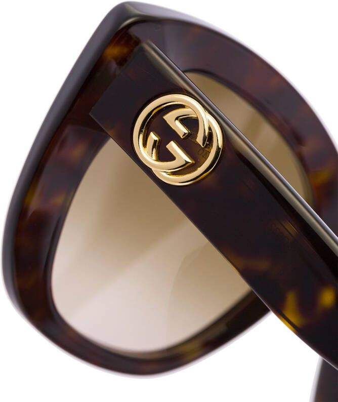 Gucci Eyewear Havana zonnebril met kattenoog montuur Bruin