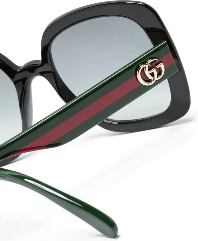 Gucci Eyewear Zonnebril met D-montuur Zwart