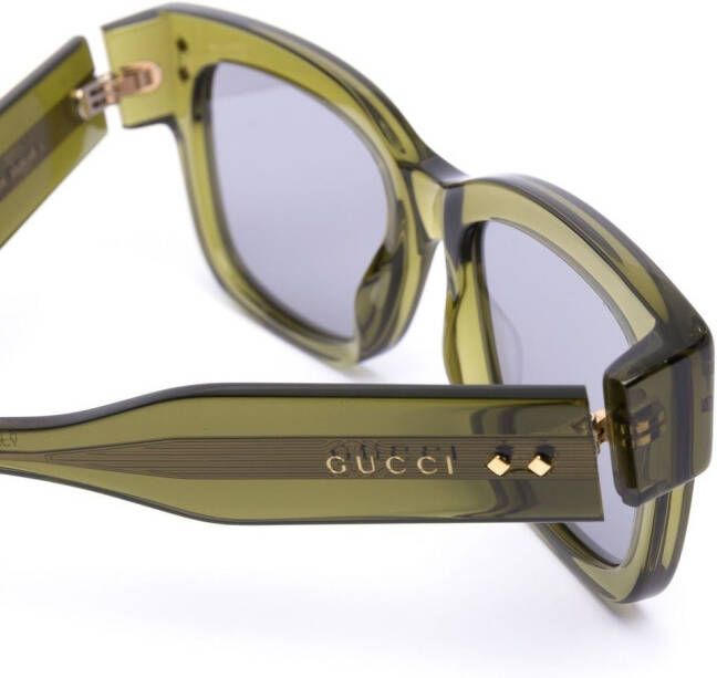 Gucci Eyewear Zonnebril met doorzichtig montuur Groen
