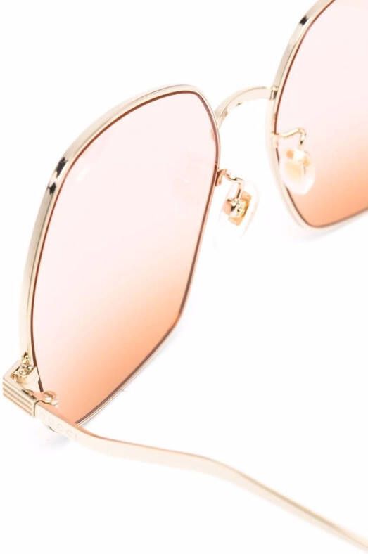 Gucci Eyewear Zonnebril met geometrisch montuur Goud