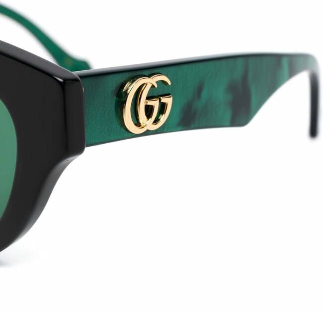 Gucci Eyewear Zonnebril met kattenoog montuur Groen