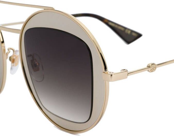 Gucci Eyewear zonnebril met metallic frame Bruin