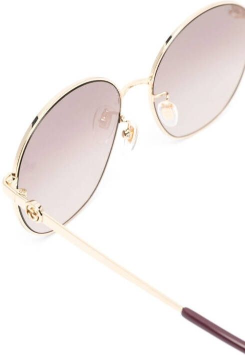Gucci Eyewear Zonnebril met vierkant montuur Goud