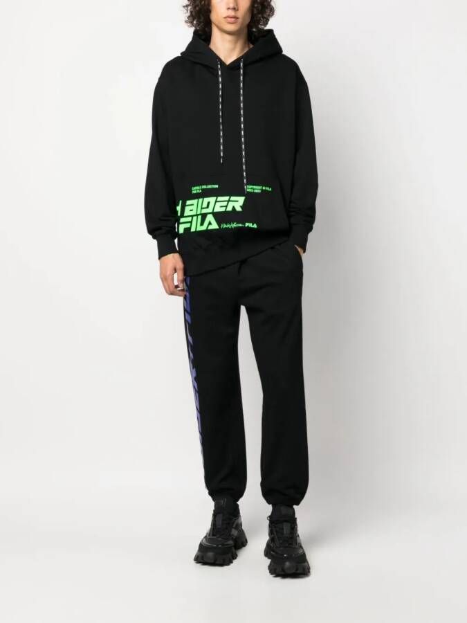 Haider Ackermann x Fila trainingsbroek met logoprint Zwart