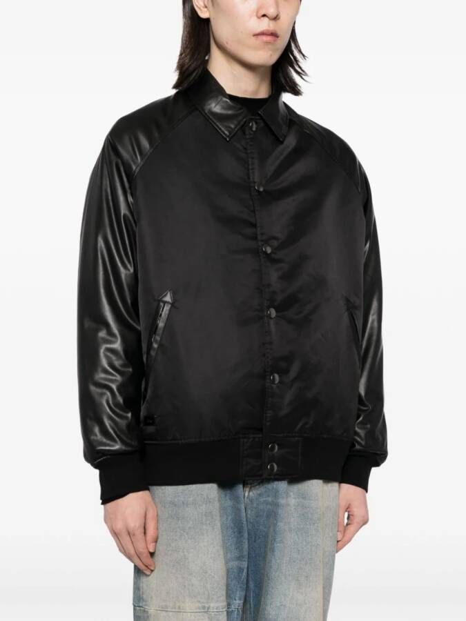 izzue panelled bomber jacket Zwart