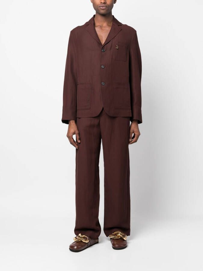 Jacquemus Jack met enkele rij knopen Bruin
