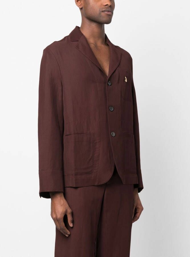 Jacquemus Jack met enkele rij knopen Bruin