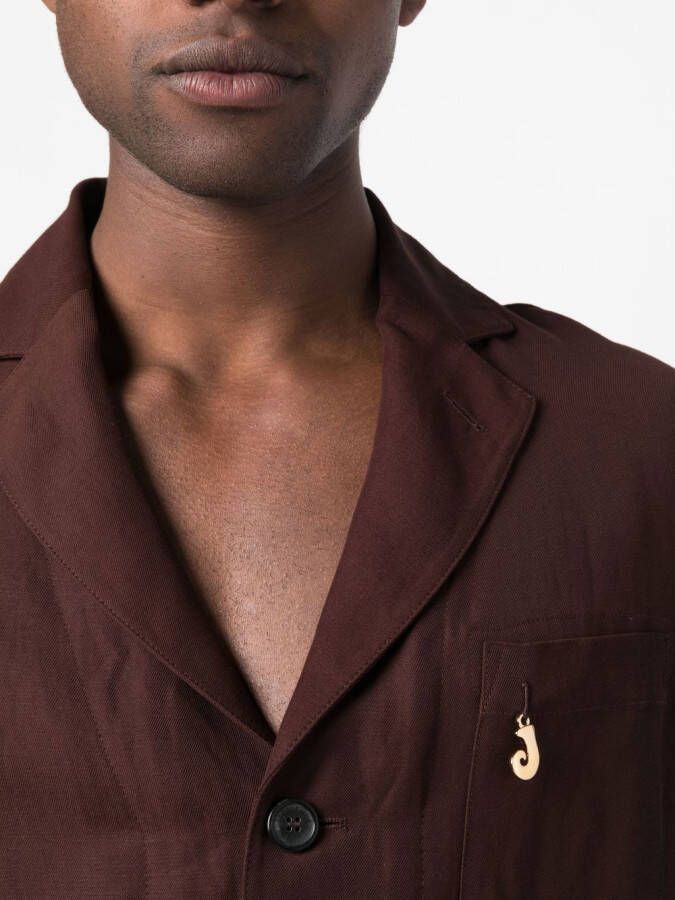 Jacquemus Jack met enkele rij knopen Bruin