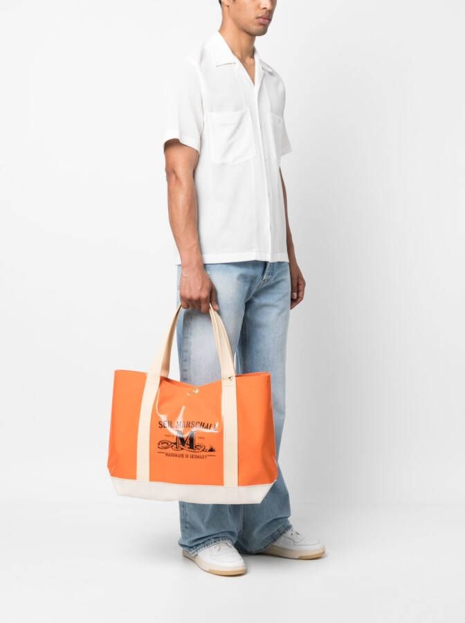 Junya Watanabe MAN Shopper met grafische print Oranje