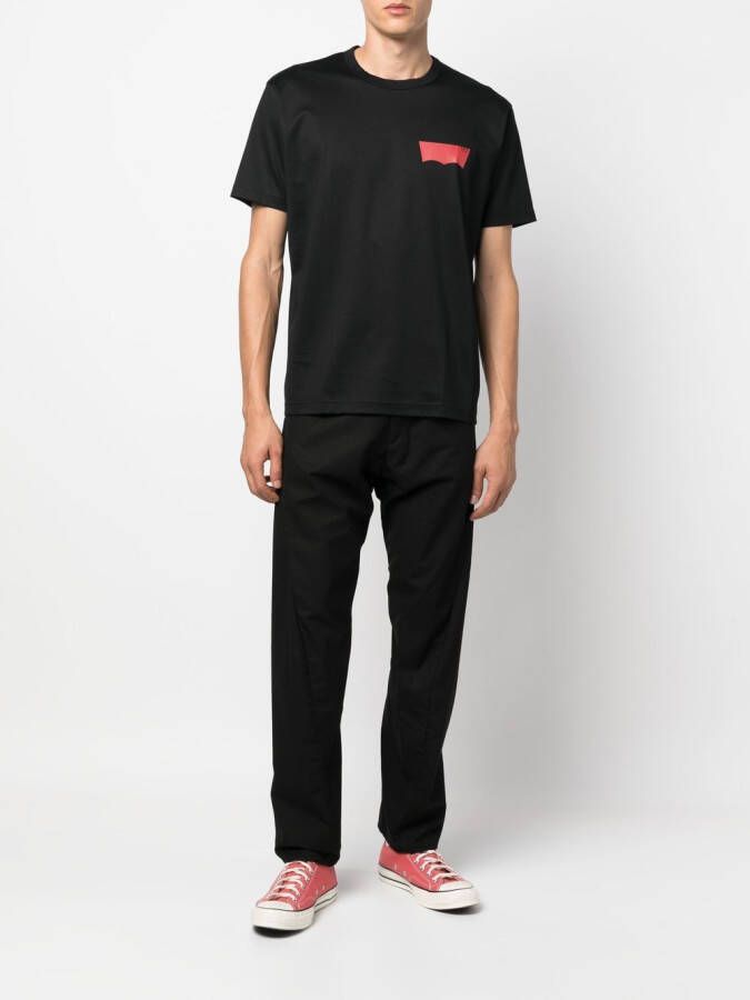 Junya Watanabe MAN T-shirt met logoprint Zwart