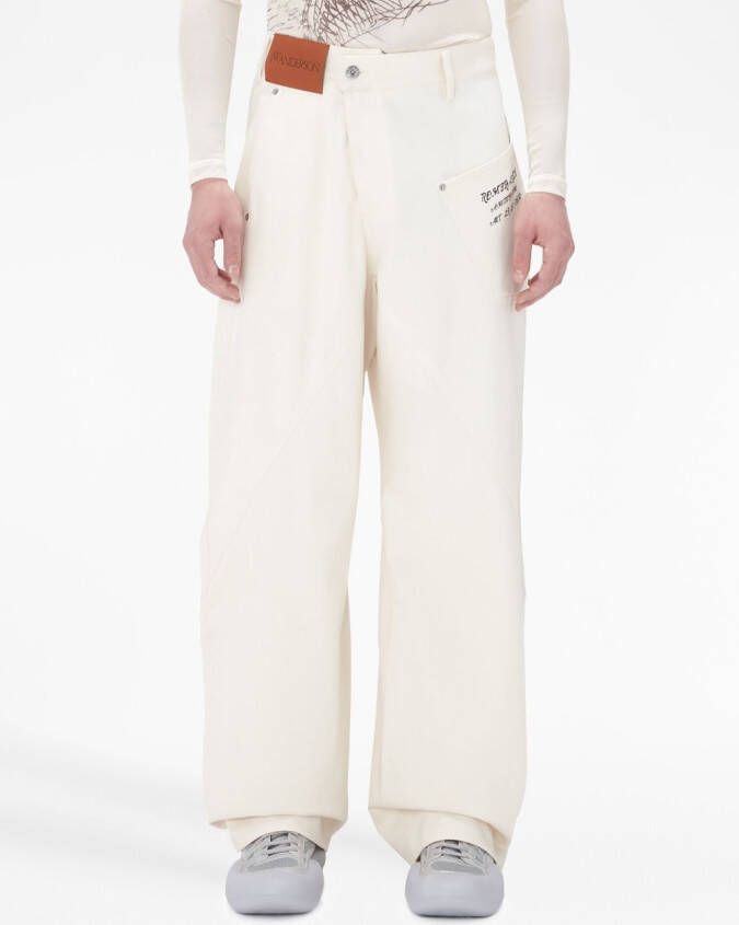 JW Anderson Broek met logopatch en wijde pijpen Beige
