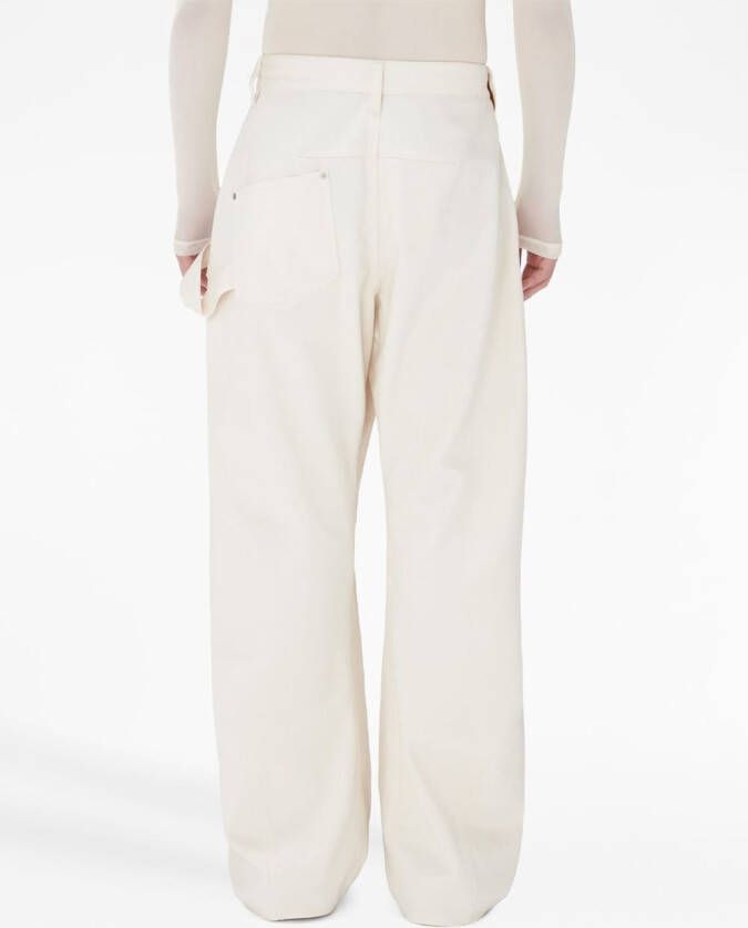 JW Anderson Broek met logopatch en wijde pijpen Beige