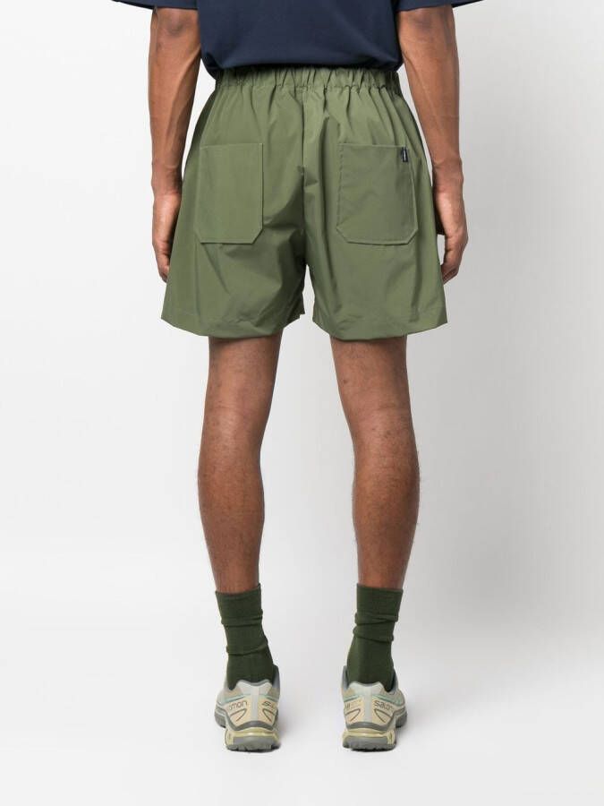 Mackintosh Captain shorts met print Groen