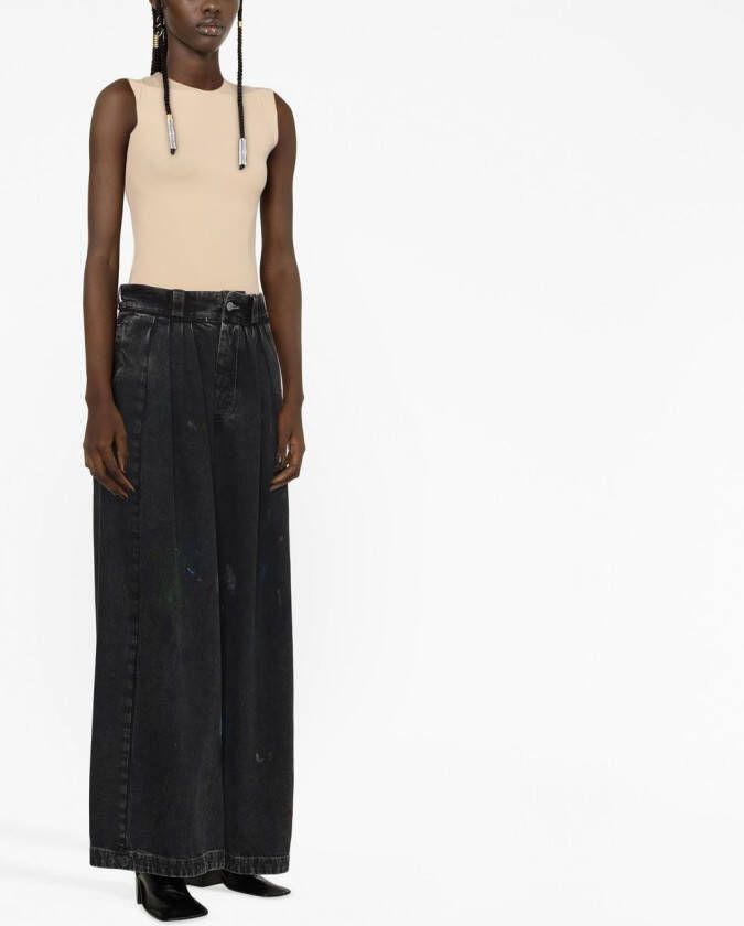 Maison Margiela Jeans met verfspatten Zwart