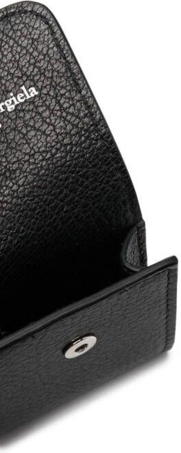 Maison Margiela Hoesje voor oordopjes met textuur Zwart