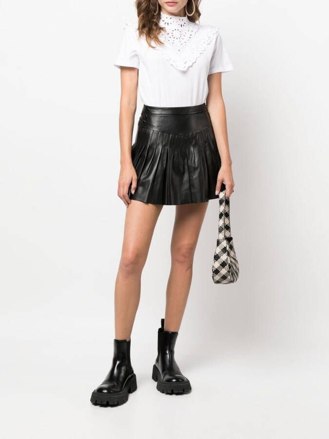 Maje Mini-rok met knoopdetail Zwart