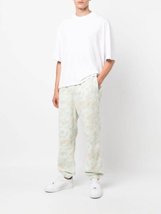 Martine Rose Trainingsbroek met bloemenprint Groen