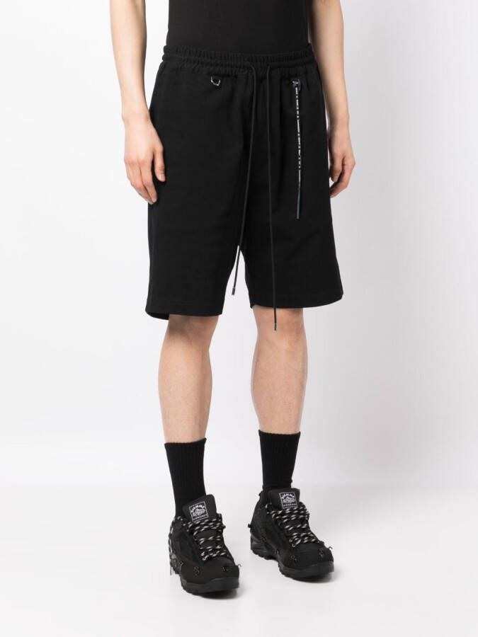 Mastermind Japan Bermuda shorts met logoprint Zwart