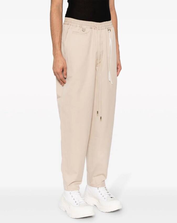 Mastermind Japan Trainingsbroek met doodskop applicatie Beige