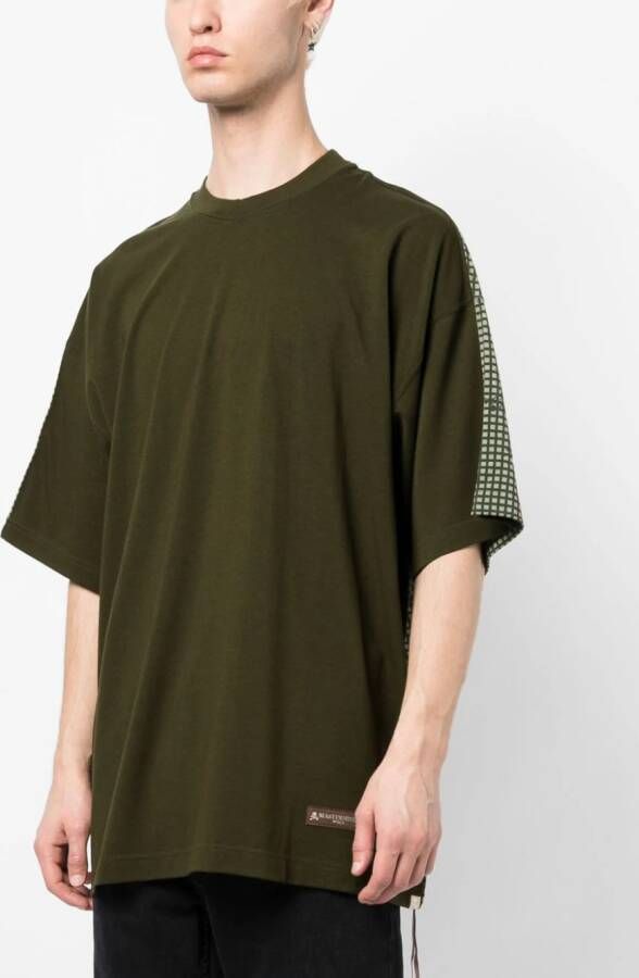 Mastermind World T-shirt met grafische print Groen