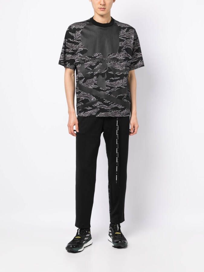 Mastermind World Trainingsbroek met camouflageprint Zwart