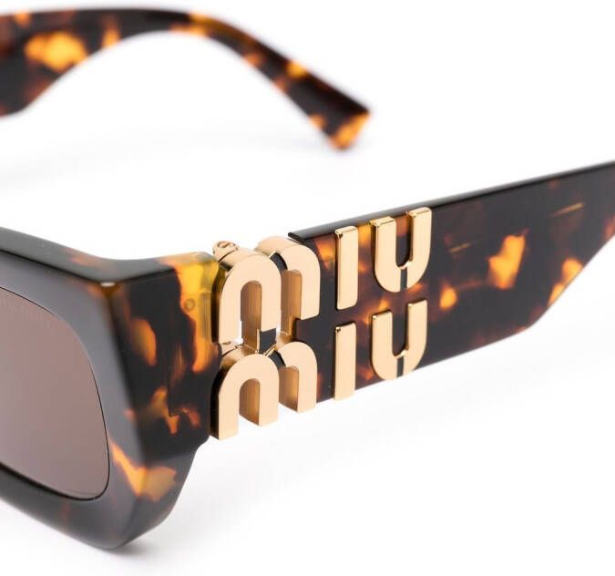Miu Eyewear Zonnebril met cat-eye montuur Bruin