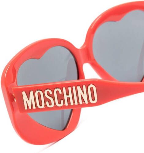 Moschino Eyewear Zonnebril met hartvormig montuur Rood