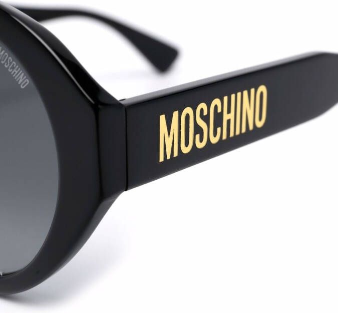 Moschino Eyewear Zonnebril met rond montuur Zwart