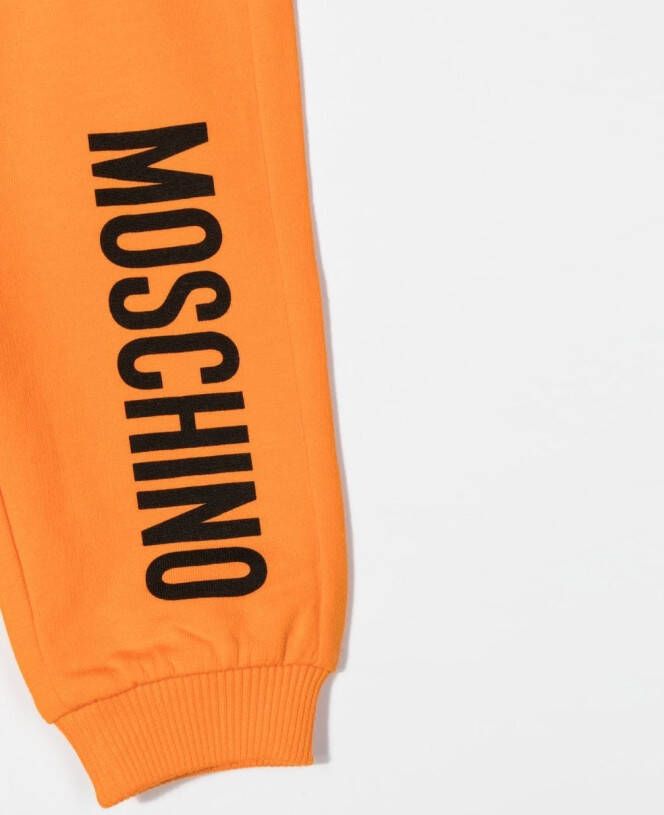 Moschino Kids Trainingsbroek met logoprint Oranje