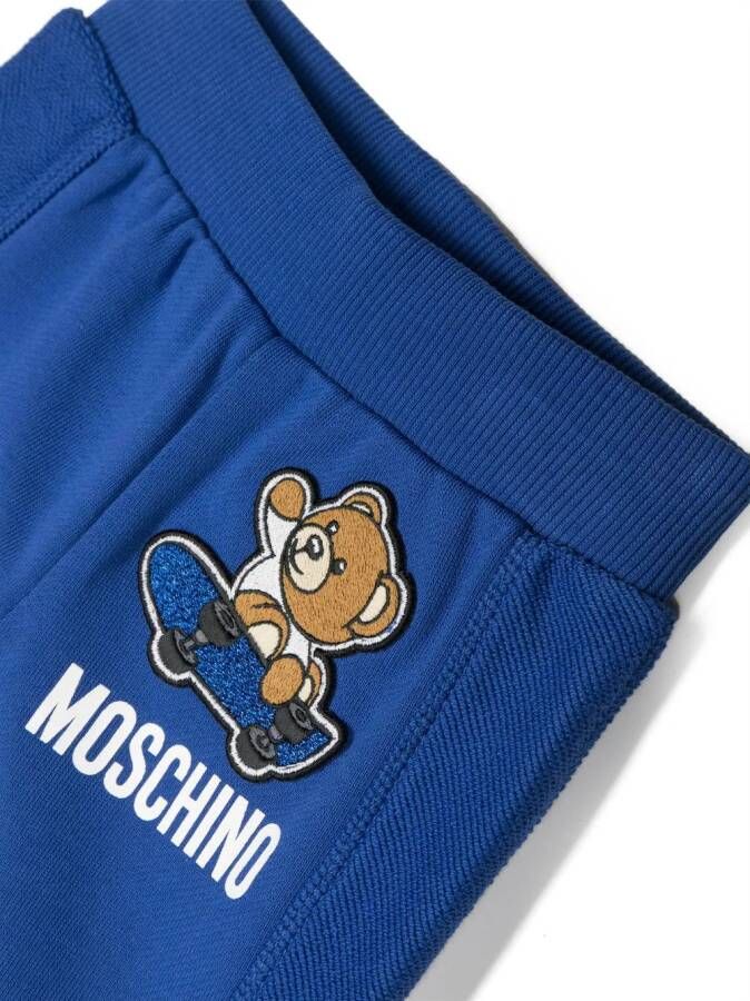 Moschino Kids Trainingspak met teddybeerprint Blauw