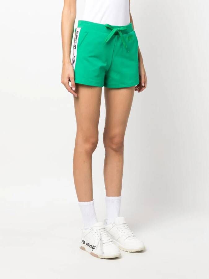Moschino Shorts met logo-reliëf Groen