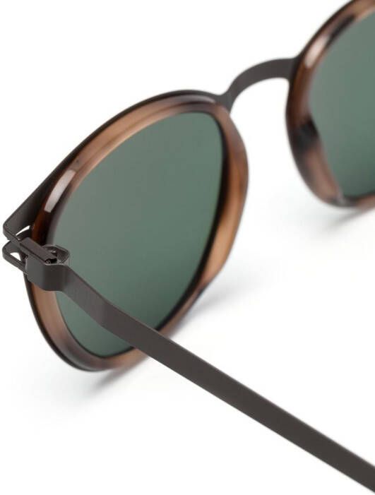 Mykita Siwa 711 zonnebril met rond montuur Bruin