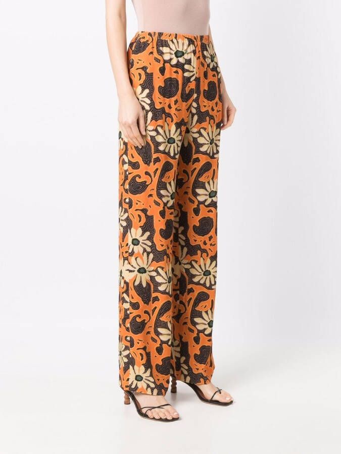 Nanushka Broek met bloemenprint Oranje