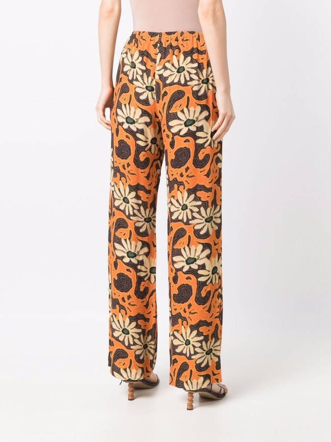 Nanushka Broek met bloemenprint Oranje