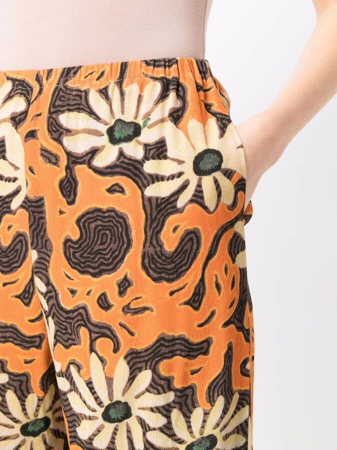 Nanushka Broek met bloemenprint Oranje