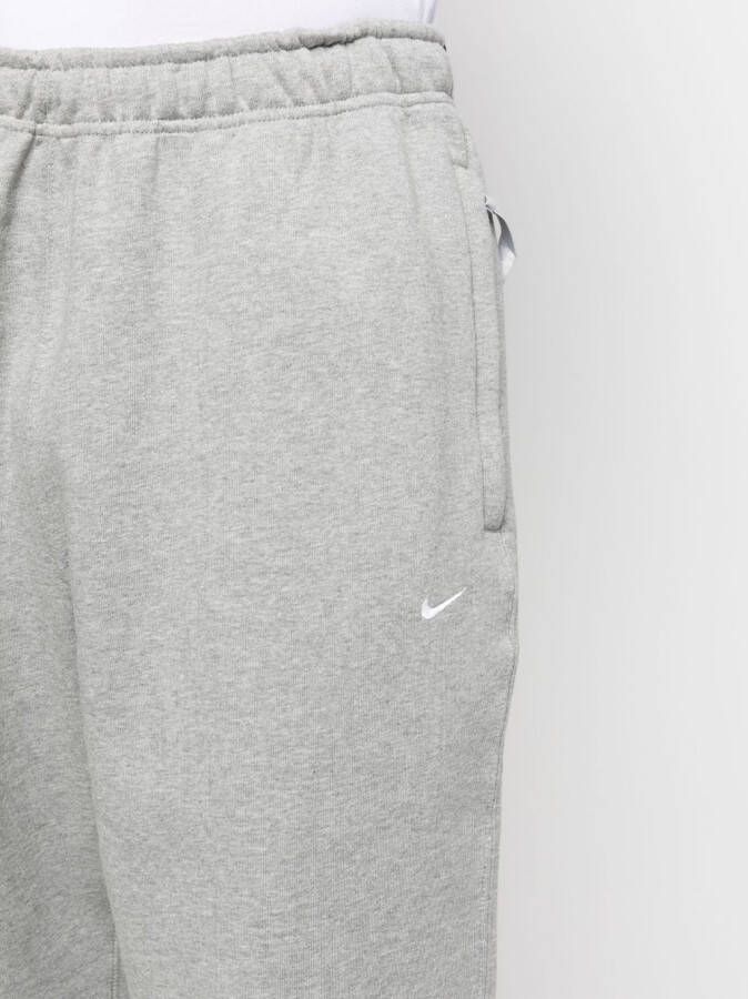 Nike Swoosh logo-embroidered track pants Grijs