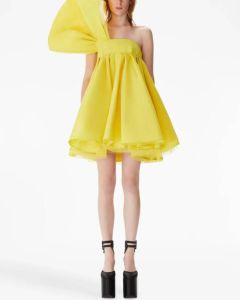 Nina Ricci Asymmetrische jurk Geel