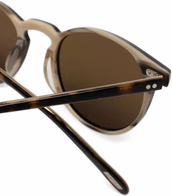Oliver Peoples Riley zonnebril met rond montuur Bruin