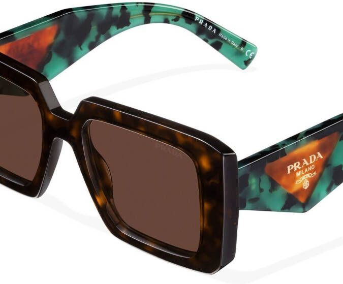 Prada Eyewear Symbole zonnebril met contrasterend detail Bruin