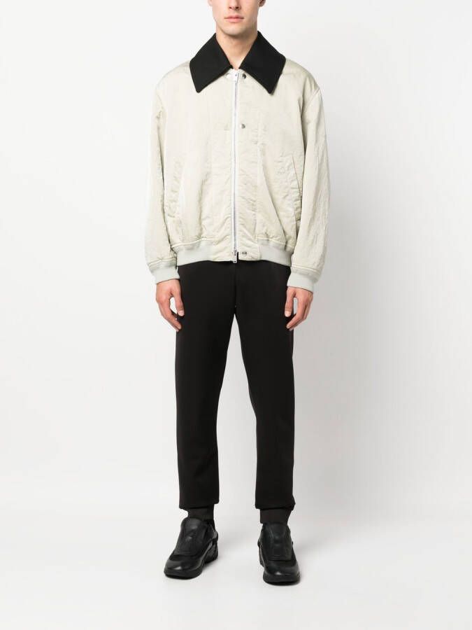 Raf Simons Trainingsbroek met toelopende pijpen Zwart