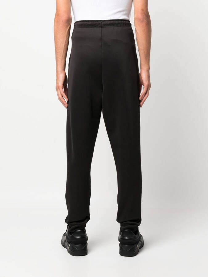 Raf Simons Trainingsbroek met toelopende pijpen Zwart