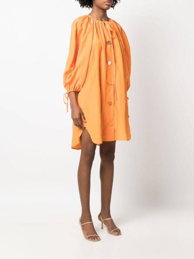 Rejina Pyo Jurk met kenmerkende knoop Oranje