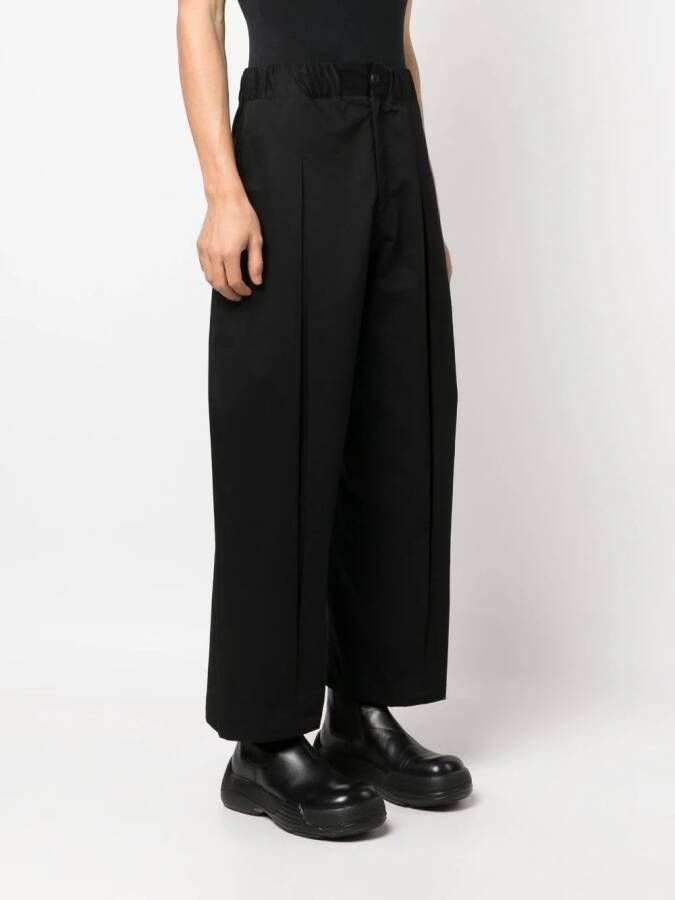 SAGE NATION box-pleat wide-leg trousers Zwart