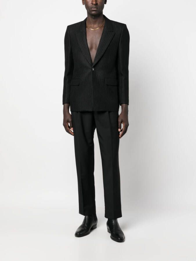 Saint Laurent Jack met enkele rij knopen Zwart