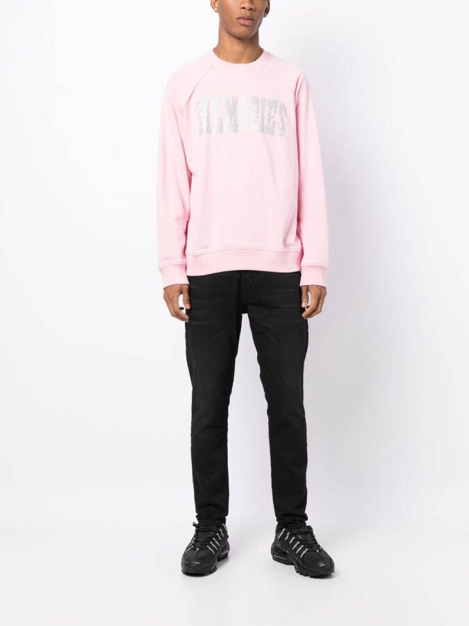 Stain Shade x Hiroshi Fujiwara sweater met tekst Roze