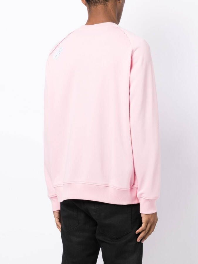 Stain Shade x Hiroshi Fujiwara sweater met tekst Roze